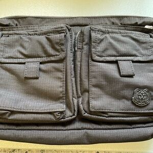 Black/ multicolored belt Bag that converts into a backpack.